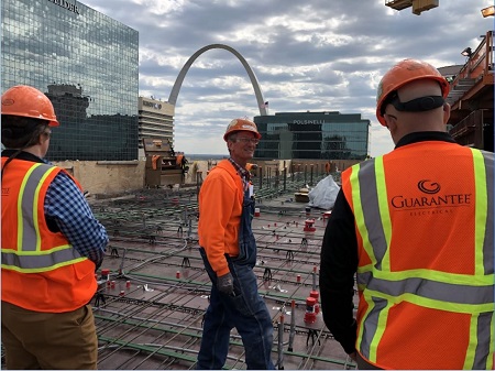 Electricians in hard hats at Ballpark Village – One Cardinal Way project