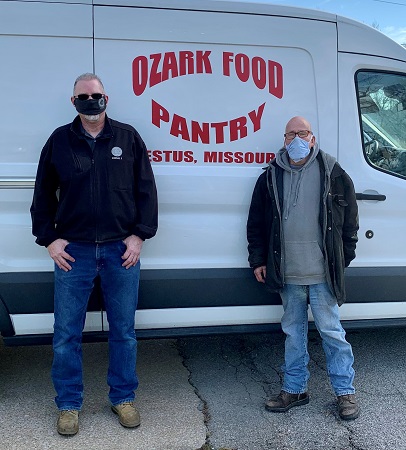IBEW Local 1 Business Representative Chuck DeMoulin and Gary Bourd, who works at Ozark Food Pantry