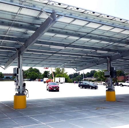 IBEW Local 1 Union Hall features EV charging stations topped by a solar array