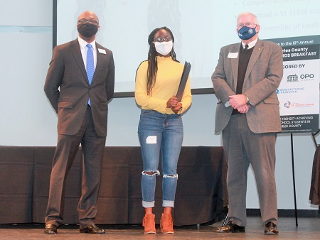 Dr. Curtis Cain, superintendent, Wentzville School District; Euncie Antwi, Fort Zumwalt East; and Jim Curran, executive vice president, Electrical Connection