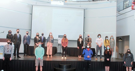 Group of high school students in masks attending an event